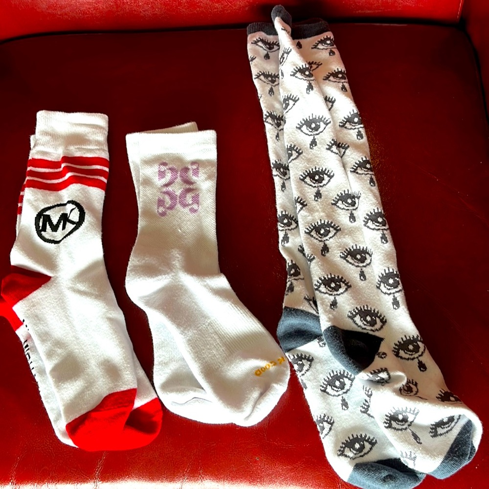 Three pairs of tall socks (Glossier, Michael Kors, and eyes) NWOT